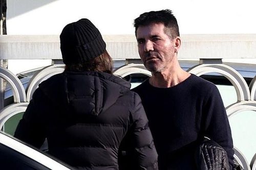 Simon Cowell tranh cãi với bạn gái trên phố