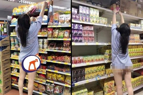 Thản nhiên nhón chân lấy gói mì trên kệ, cô gái lộ nguyên vòng 3 khiến người xung quanh 'đỏ mặt'