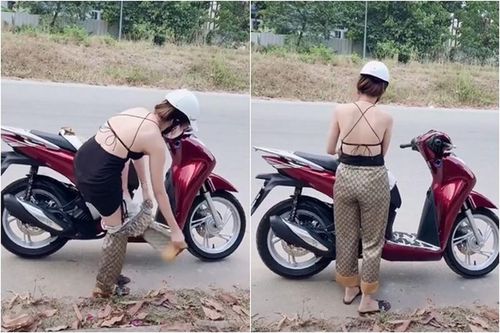 Đang lái xe, cô gái dừng lại làm điều khiến ai cũng choáng