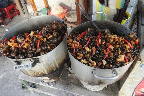Vị ngon từ món ốc xào xứ Huế