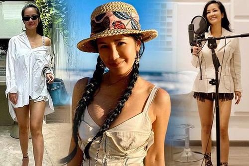 Hồng Nhung chăm 'lên đồ' khoe đôi chân nuột nà, đến túi nửa tỷ cũng hóa phông nền