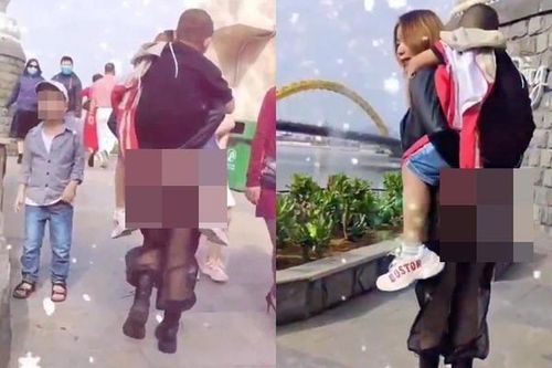 Mặc quần xuyên thấu cõng con, người phụ nữ 'thả rông' gây phẫn nộ