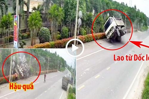 Phi lên từ dốc với tốc độ cao, xe tải lật úp bên đường