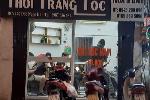Hà Nội 'nhộn nhịp' dịch vụ cắt tóc ngày đầu mở cửa trở lại