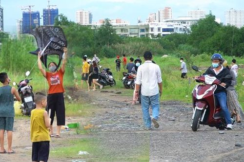 Dân Sài Gòn bỏ khẩu trang, vô tư ăn uống, thả diều dù đang giãn cách