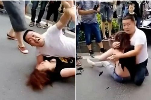 'Tiểu tam' bị vợ đánh ghen lột đồ, chồng ôm chặt người tình để bảo vệ