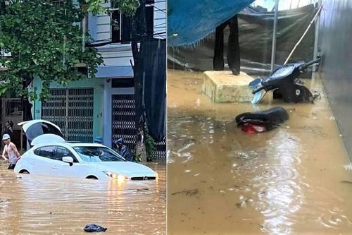 Lào Cai mưa lớn, ô tô chết máy, xe máy ngập gần tới yên