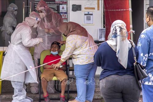 Malaysia thêm 14.516 ca mắc, 207 ca ca tử vong do COVID-19