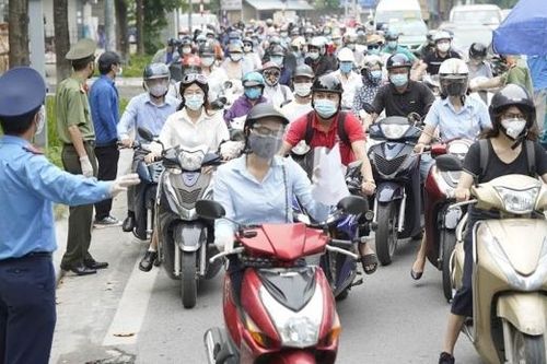 Hà Nội: Bỏ quy định đi đường phải có lịch trực, lịch làm việc