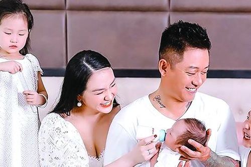 Tuấn Hưng: Từ ca sĩ 'tay chơi' thành 'ông bố quốc dân'
