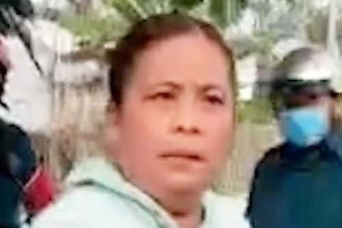 Khởi tố người phụ nữ đánh công an vì thấy chồng bị lập biên bản