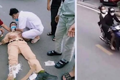 Đôi nam nữ không đội mũ bảo hiểm, lao thẳng xe vào Cảnh sát giao thông