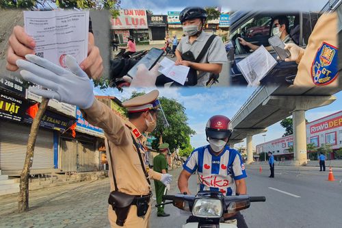 Kiểm tra mã QR ở chốt ra vào vùng đỏ Hà Nội: Không ùn tắc, giấy đi đường cũ được lưu thông