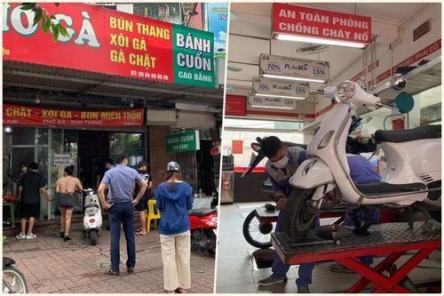 Khách Hà Nội xếp hàng chờ sửa xe, mua phở trong ngày đầu hàng quán mở cửa lại