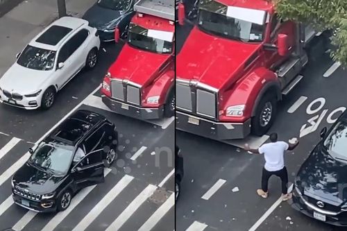 Bị thốc còi, tài xế xe SUV có hành động khiến lái xe đầu kéo 'phát điên'