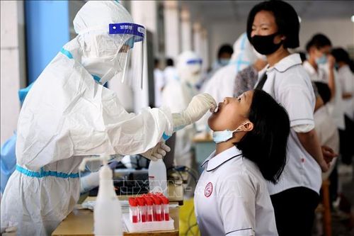 Xét nghiệm đại trà - Giải pháp dập dịch thần tốc của Trung Quốc
