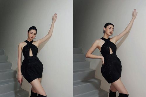 Lương Thùy Linh mặc váy yếm khoét sâu, tạo dáng ở cầu thang sang chảnh vô đối