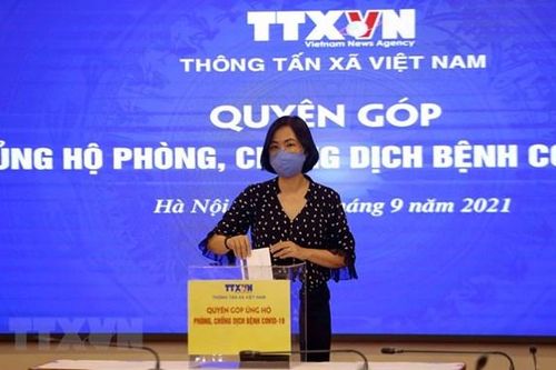 Cán bộ, nhân viên TTXVN chung tay ủng hộ công tác phòng, chống dịch COVID-19