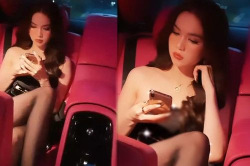 Ngọc Trinh ngồi trong 'xế hộp', diện chiếc đầm 'tàng hình' mặc như không mặc
