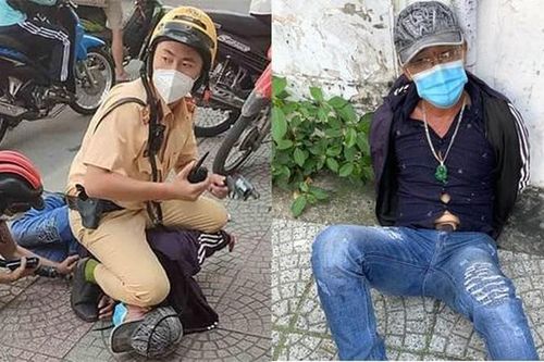 Đâm người phụ nữ gục xuống vỉa hè, gã đàn ông bị cảnh sát khống chế
