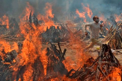 2021: Một thế giới đầy đau thương qua những khung hình