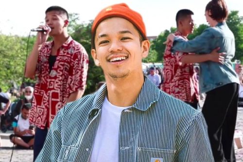 Trọng Hiếu khiêu vũ với khán giả giữa đường phố tại Đức khi trình diễn ca khúc 7 tỷ view