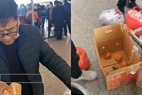 Ăn vội 30 kg cam để không mất phí hành lý ký gửi máy bay