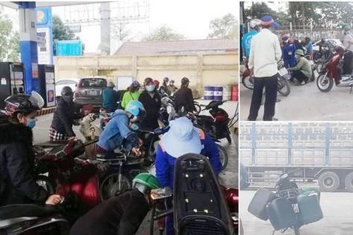 Người dân xếp hàng dài, mang thêm bình nhựa mua xăng trước giờ tăng giá