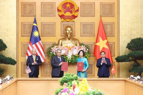 Hình ảnh Lễ trao đổi các văn kiện hợp tác Việt Nam-Malaysia