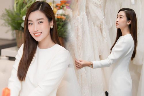 Giữa tin đồn hẹn hò thiếu gia, Hoa hậu Đỗ Mỹ Linh rạng rỡ đi xem váy cưới, gì thế này?