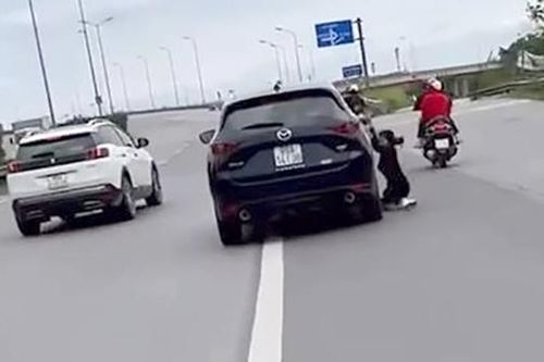 Triệu tập lái xe ô tô kéo lê vợ trên đường vành đai 3