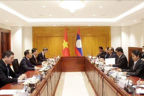 Việt Nam và Lào chia sẻ kinh nghiệm các vấn đề về dân tộc
