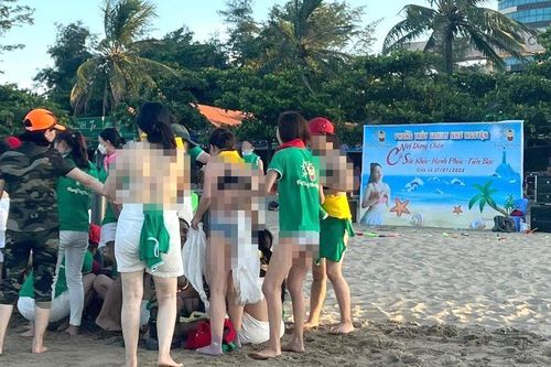 Cơ quan chức năng làm việc với đơn vị tổ chức Team Building cho du khách nữ cởi áo phản cảm