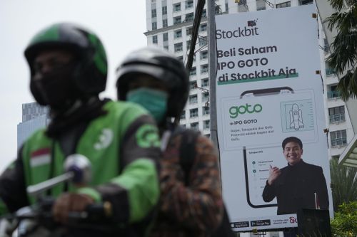 Vốn hóa công ty mẹ Gojek vượt mặt Grab
