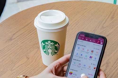 MoMo trở thành ví điện tử đầu tiên tích hợp thanh toán tại chuỗi Starbucks Vietnam