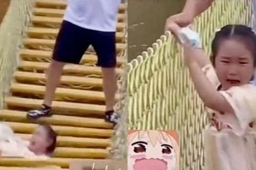 Cha đùa dai làm con gái rơi khỏi cầu treo ở Trung Quốc