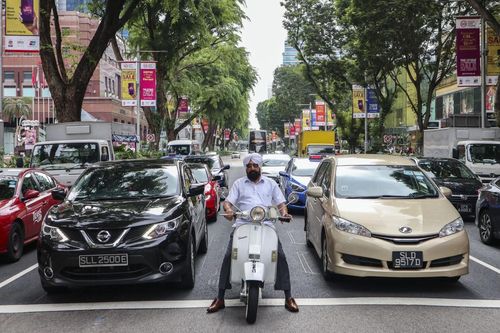 Đi xe máy ở Singapore mất phí tới 9.000 USD
