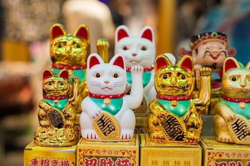 Câu chuyện thú vị về nguồn gốc ra đời tượng mèo Maneki-neko may mắn nổi tiếng của Nhật Bản