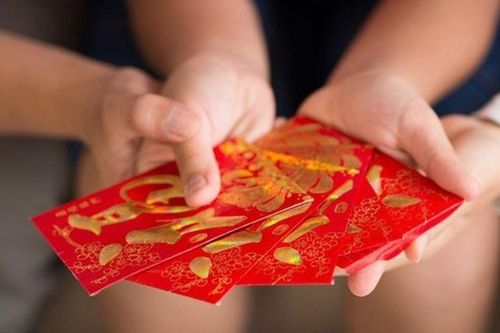 Tiền lì xì Tết: Người gửi ngân hàng, mua xe, người phân bổ theo công thức đặc biệt
