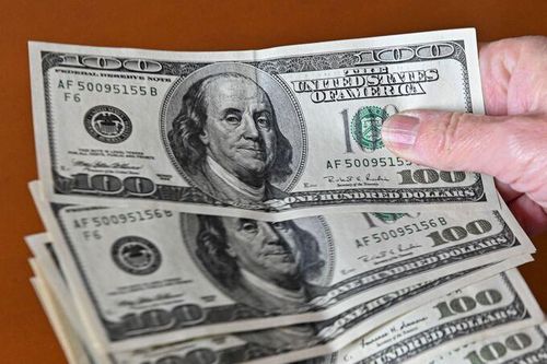 Đà tăng của USD chững lại, các nhà đầu tư thở phào