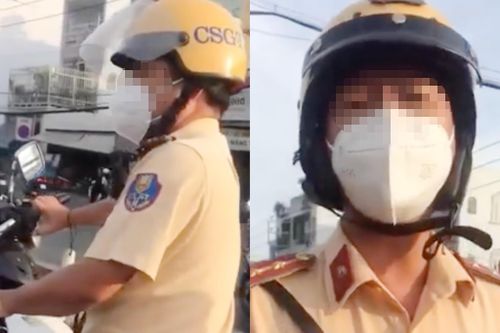 Tài xế ở TP.HCM bị hất rơi điện thoại 2 lần khi ghi hình CSGT
