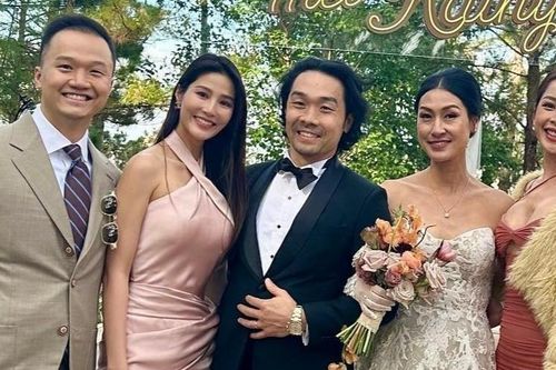 Kathy Uyên hôn chồng doanh nhân trong lễ cưới