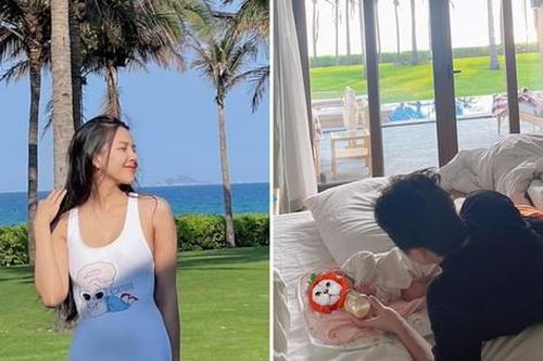 Phan Mạnh Quỳnh bế con cho vợ thả dáng với bikini