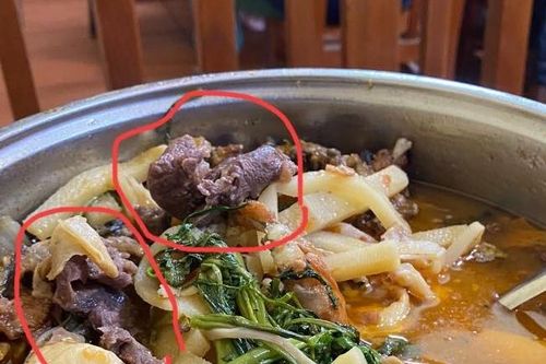 Tạm đình chỉ nhà hàng ở Hà Nội bị tố cho khách dùng nước lẩu thừa