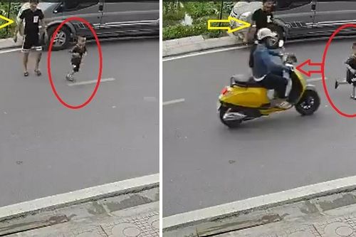 Con chạy sang đường bị xe đâm, ông bố đánh nữ tài xế tới tấp