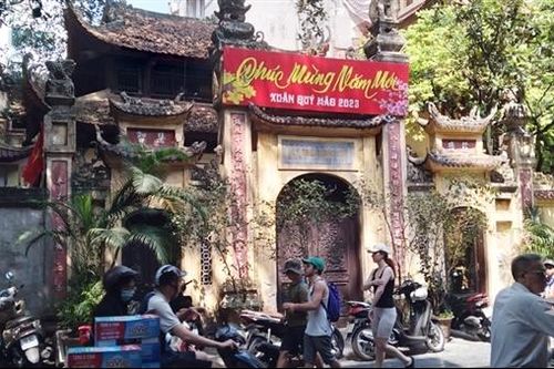 Đòn gánh cong vai phố