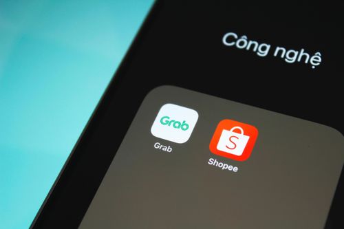 Cách Grab và Shopee tìm đường thoát lỗ