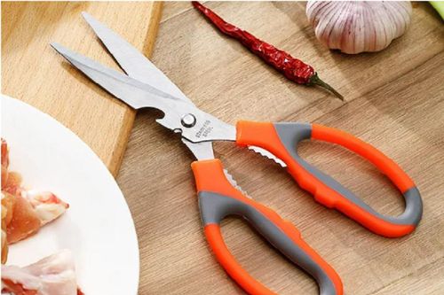 Lỗ khuyết, lỗ răng cưa trên kéo dùng để làm gì?