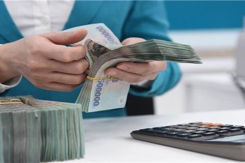 Lãi suất tiền gửi có thể giảm về 6,5%/năm