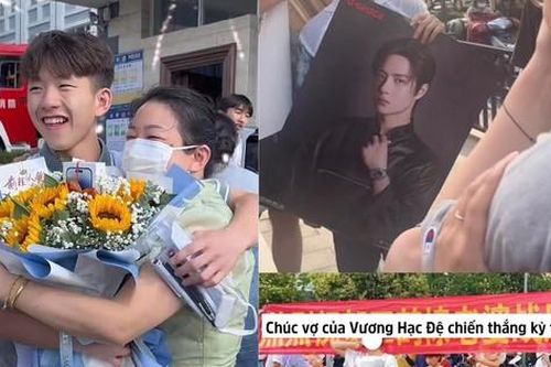 Độc lạ cách phụ huynh xứ Trung cổ vũ sĩ tử: Cầm ảnh idol, slogan 'chất như nước cất'